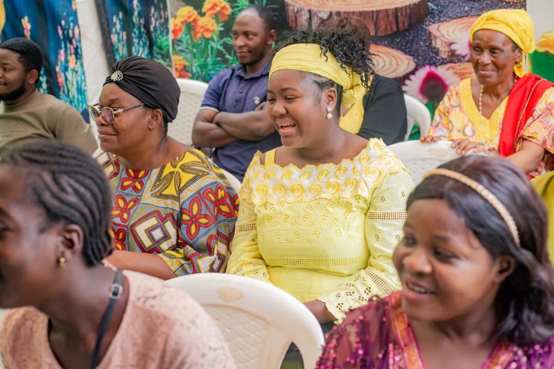 Parents and community members sharing a moment